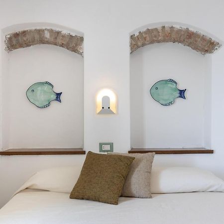 Hotel Castello Monticello Джилио Порто Екстериор снимка