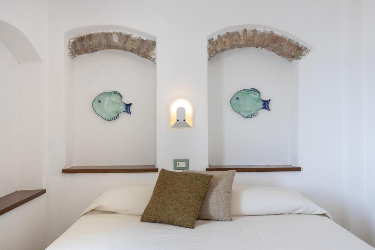 Hotel Castello Monticello Джилио Порто Екстериор снимка